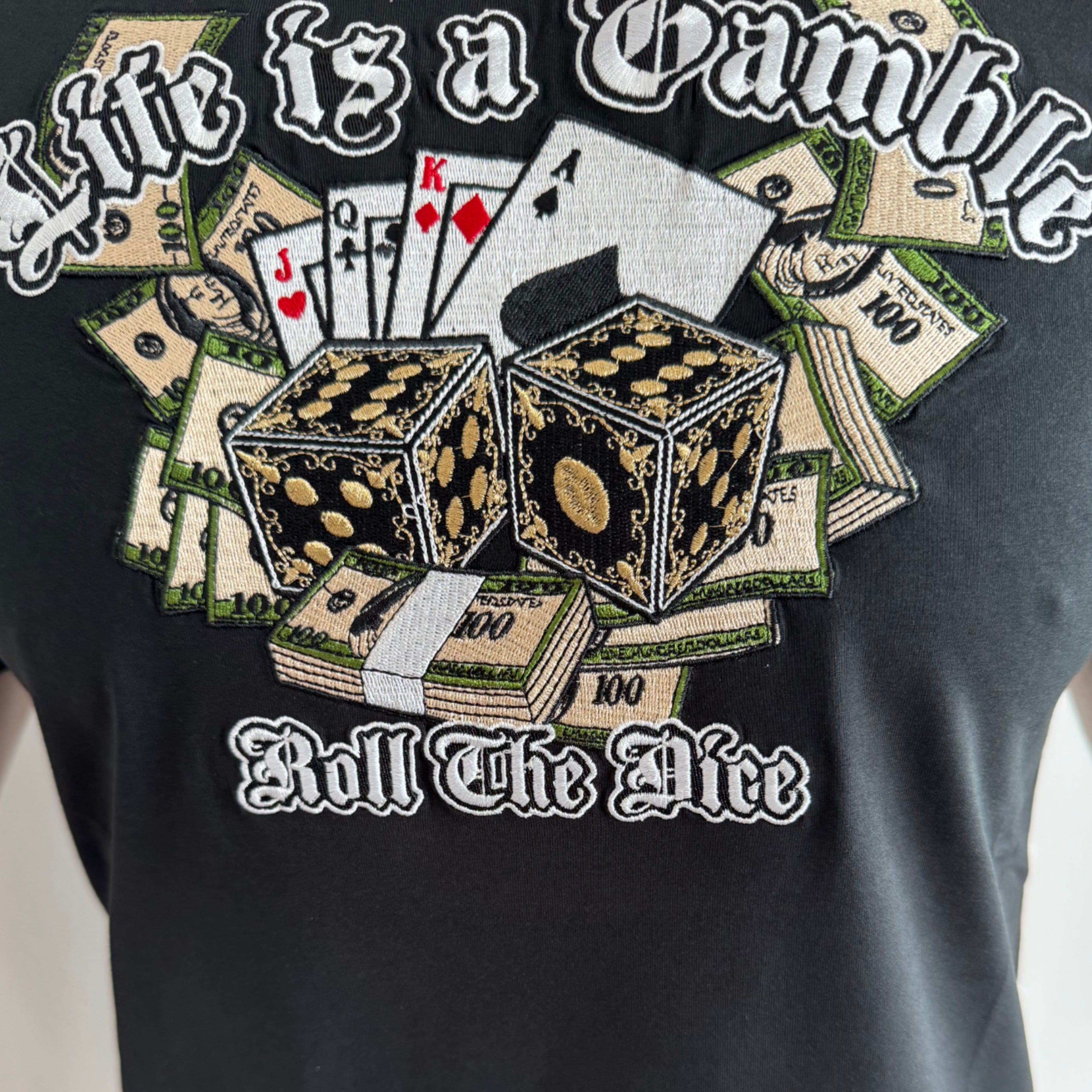 تي شيرت MVL Life بتطريز عبارة الحياة مقامرة - أسود