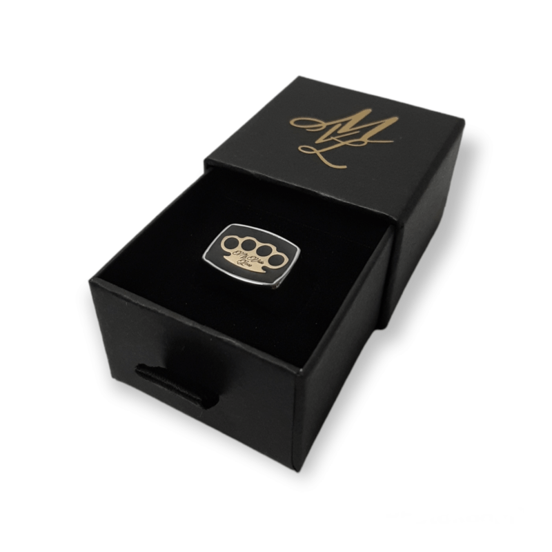 MVL signet ring in silver in an open black ring box with gold ML monogram